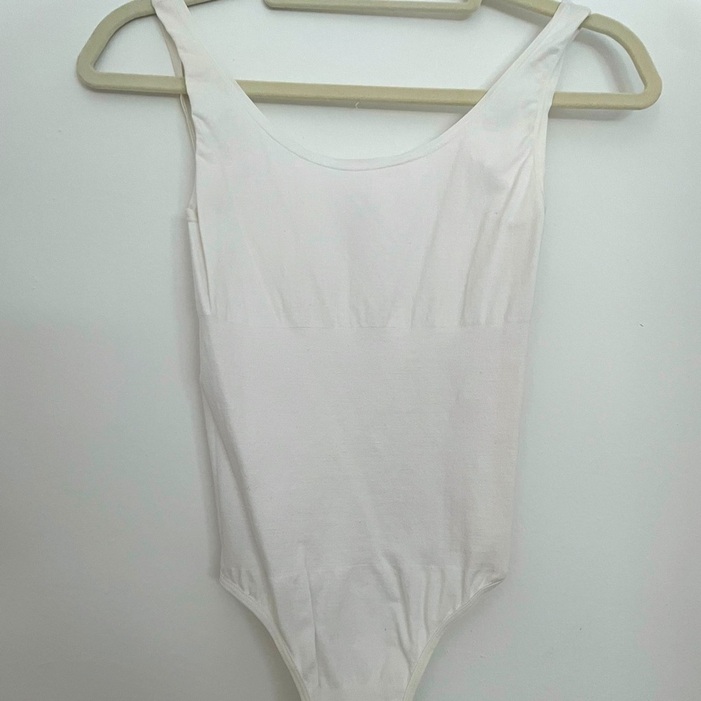 White Yummie brand bodysuit